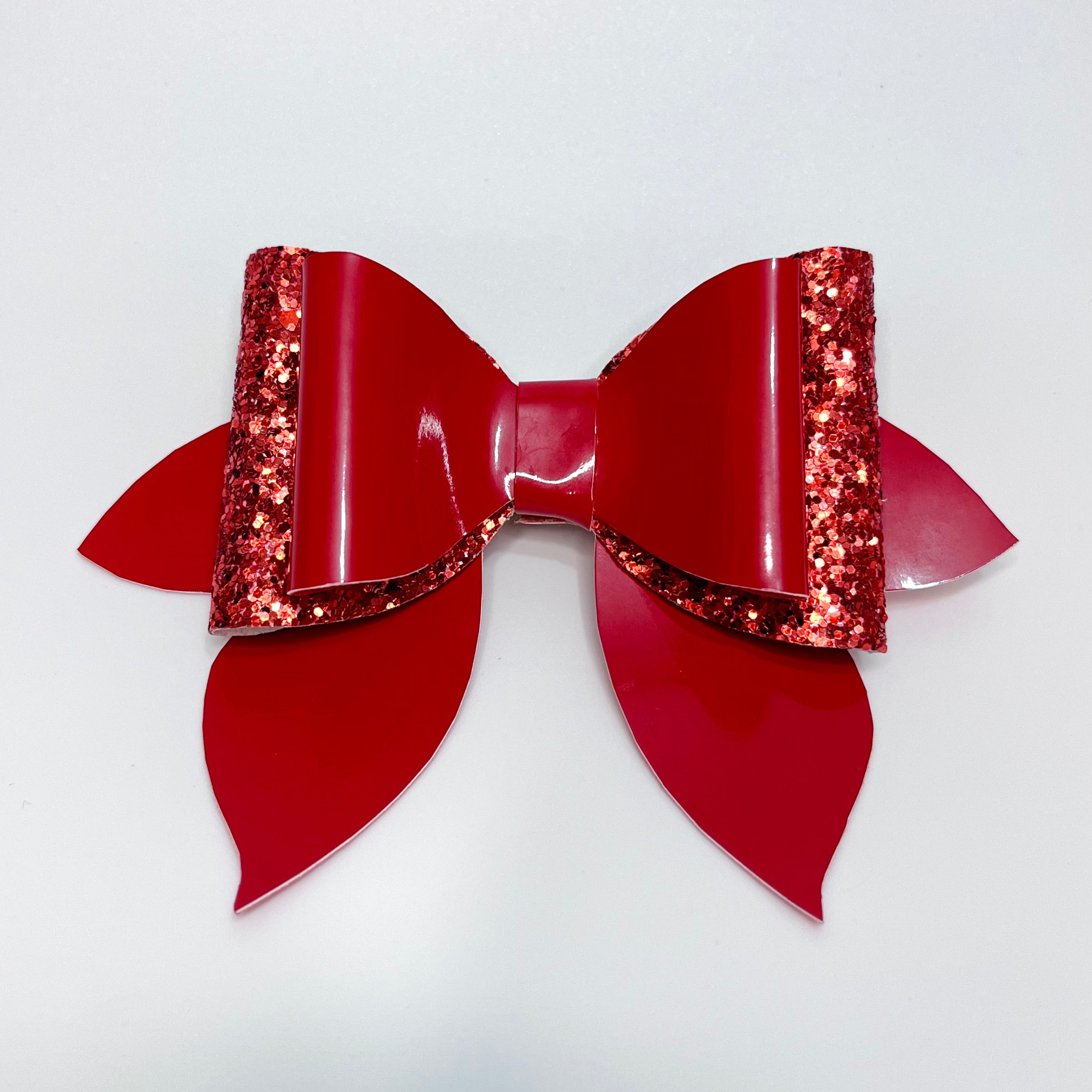 red-pigtail-bow-festive-glitter-leather-hair-clip