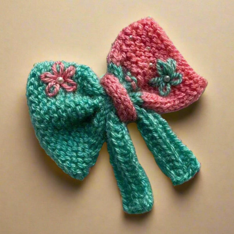 Dual-Tone Crochet Bow with Floral Embroidery and Tails