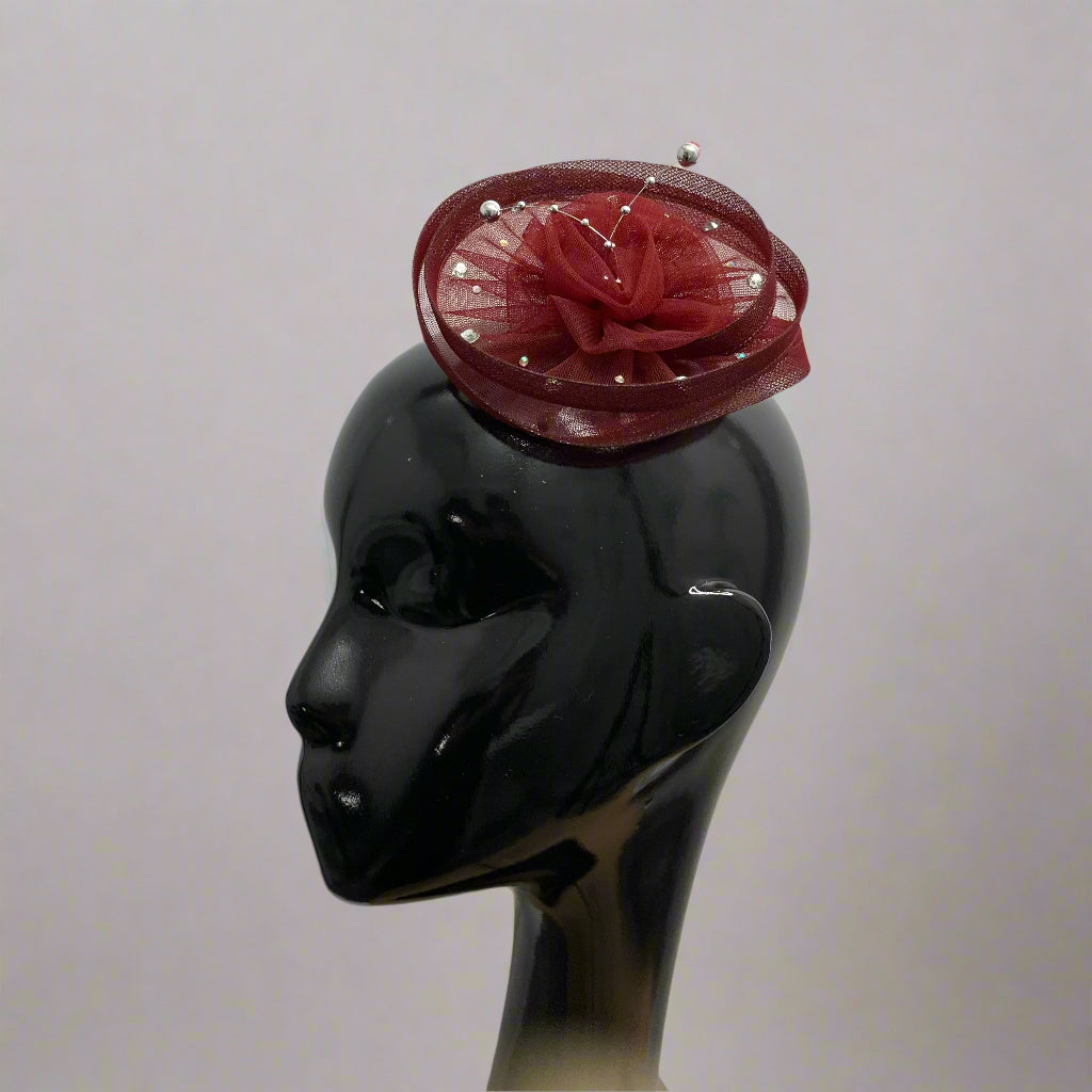 Twisted wine fascinator hat with silver strings