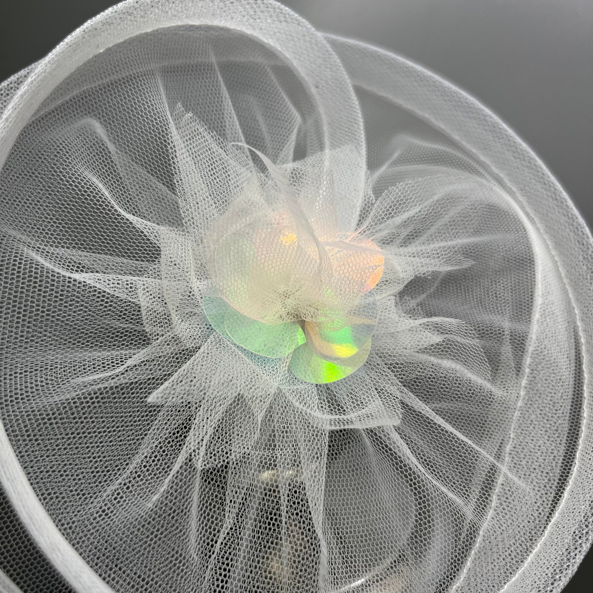 Twisted White Fascinator with Holographic flower | Luxury hair accessory