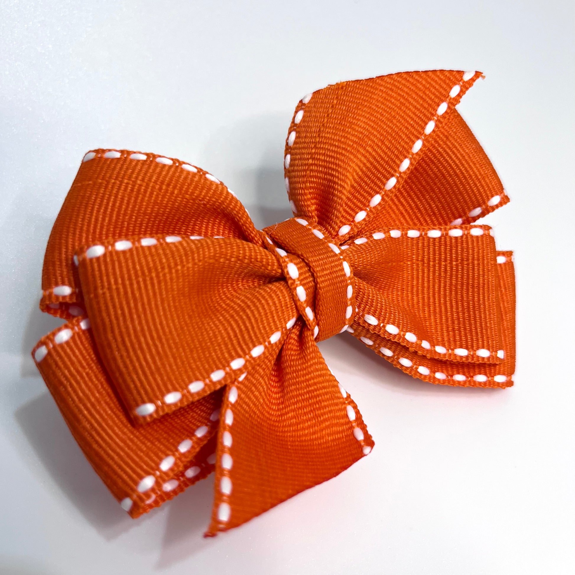 Orange Pinwheel Bow Alligator Hair Clip