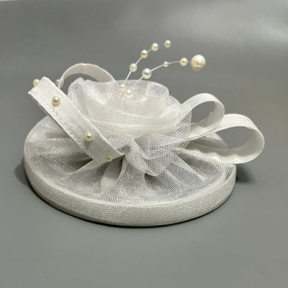 Elegant White Fascinator with flower and lace attachment